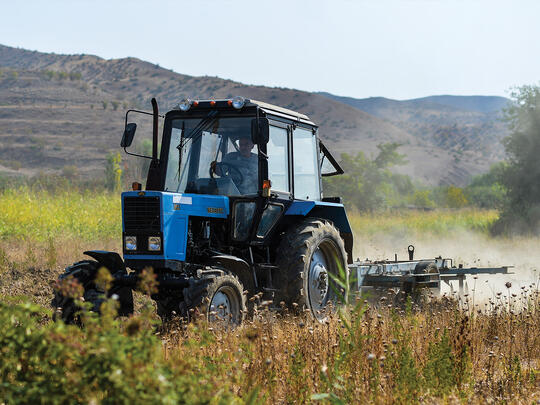 Participants in the AGBU Fields of Hope initiative enjoy access to a new tractor, free of charge.